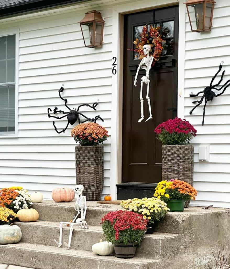 White Farmhouse Porch With Skeleton Décor