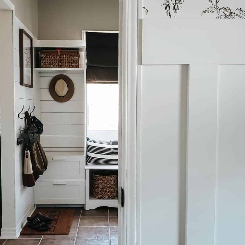 White Farmhouse Tiled Mudroom With Shiplap Wall