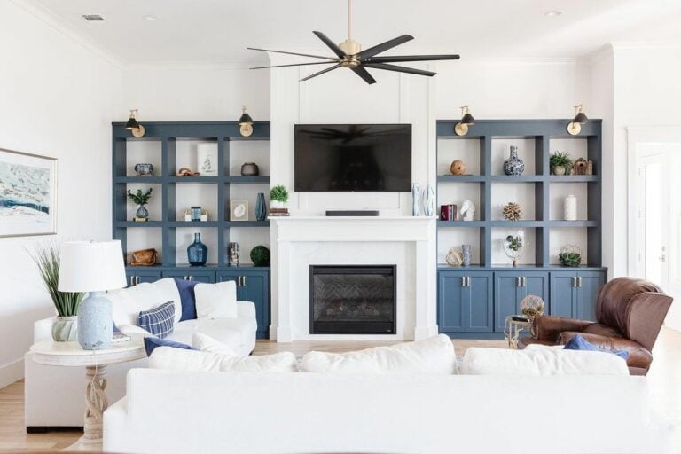White Indoor Fireplace With Navy Blue Shelves