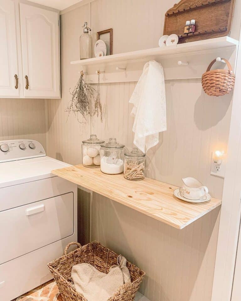 White Laundry Room With Wooden Shelf