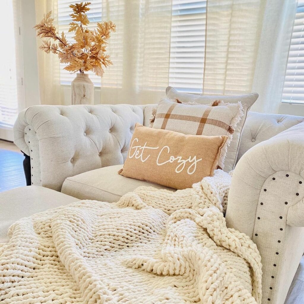 White Living Room With Upholstered Armchair