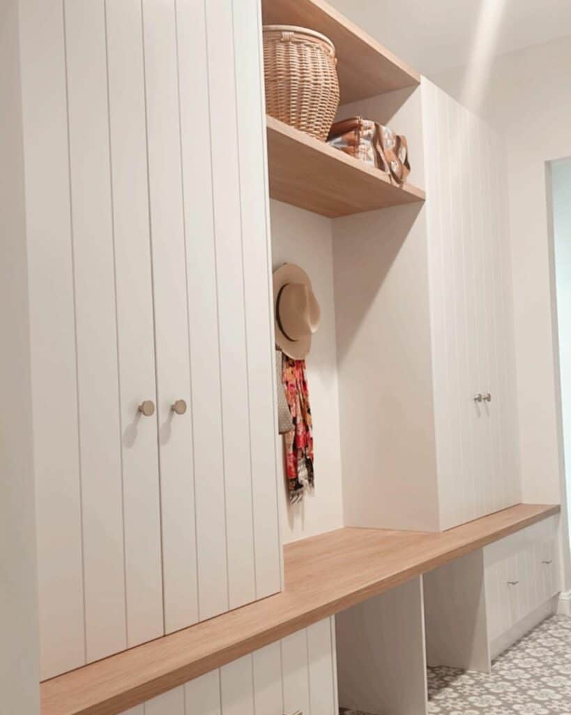 White Mudroom With Light Wooden Bench