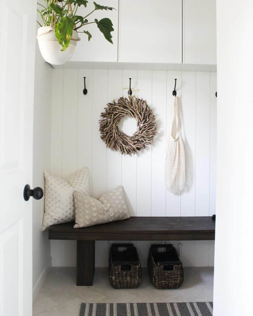 White Mudroom With Wooden Bench
