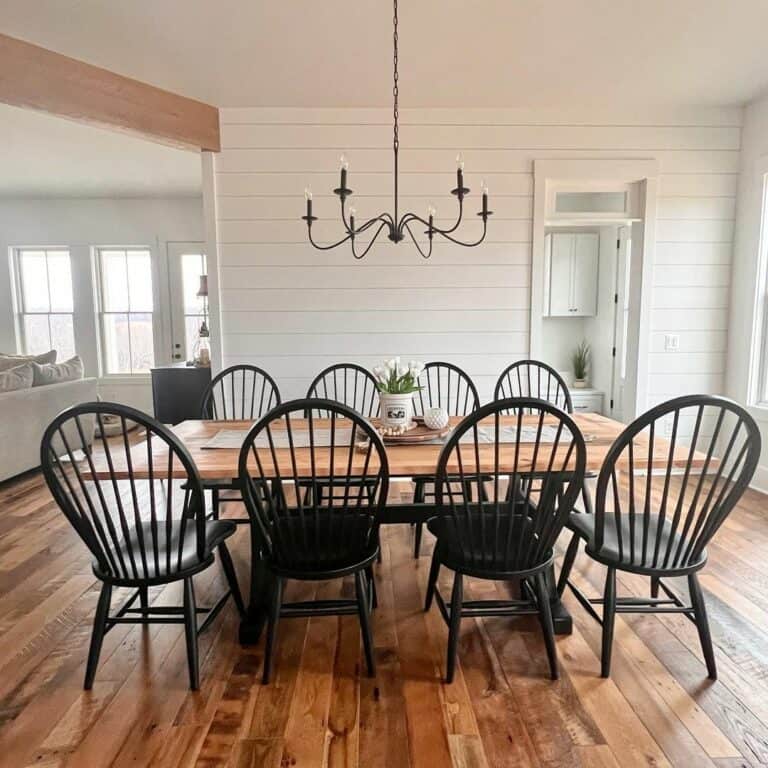 White and Wood Dining Room With Black Chairs