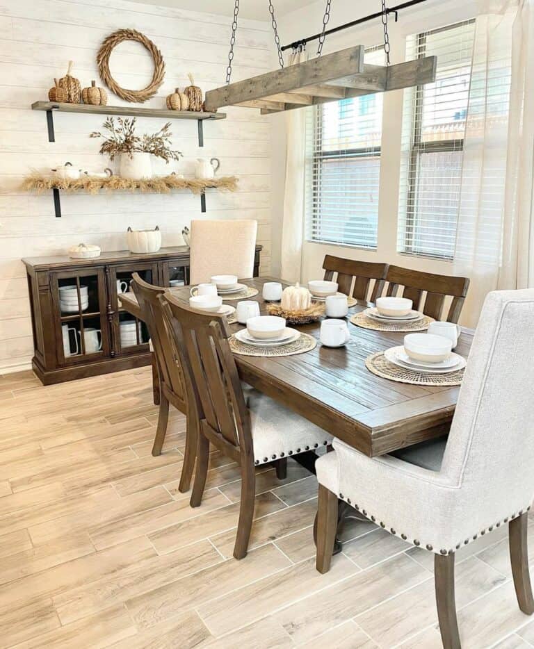 White and Wood Farmhouse Dining Room With Fall Décor