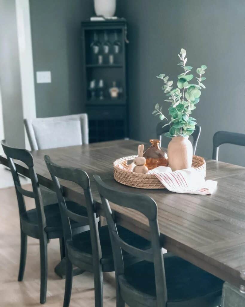 Wooden Dining Table With Simple Centerpiece