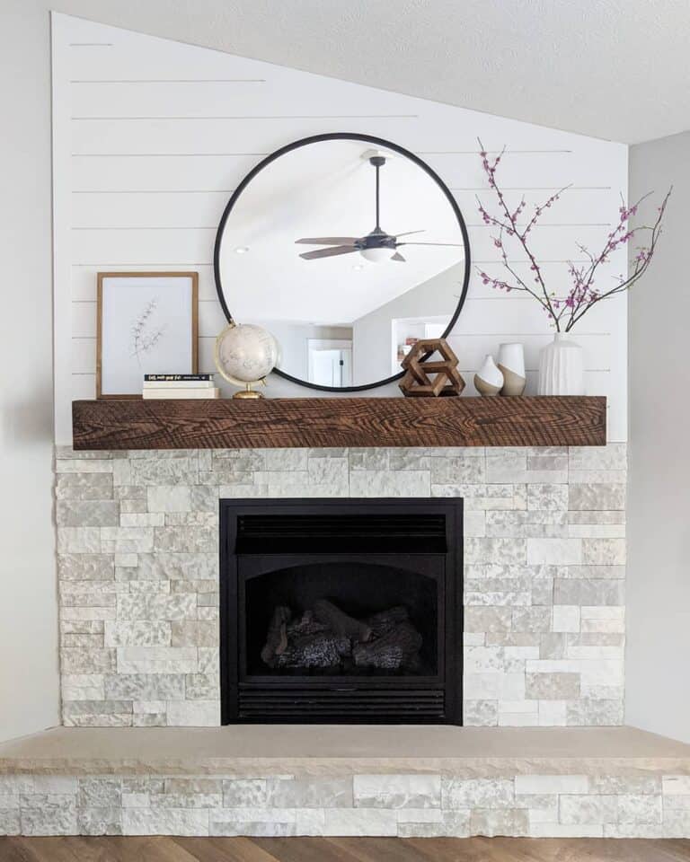 Wooden Mantel Decorated With Simple Accessories