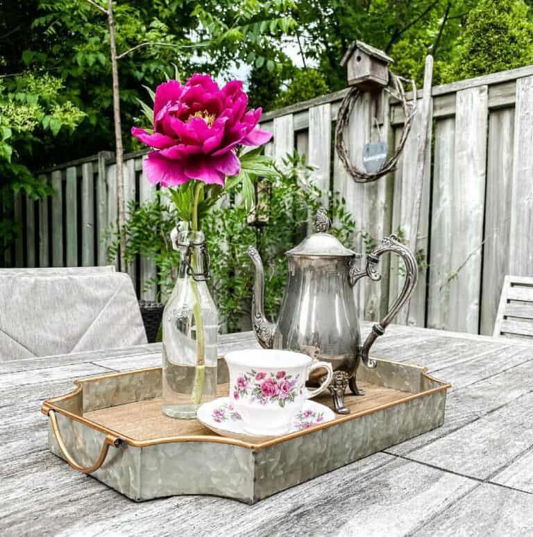 Adorable Tea Set Displayed on a Patio Table