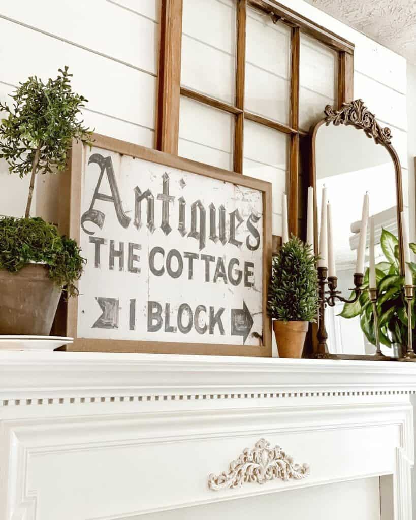 Differently Sized Frames as Mantel Décor