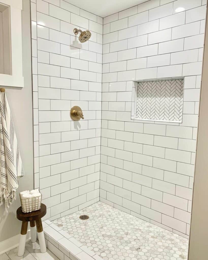 Herringbone Tile Fills a Shower Niche Soul & Lane