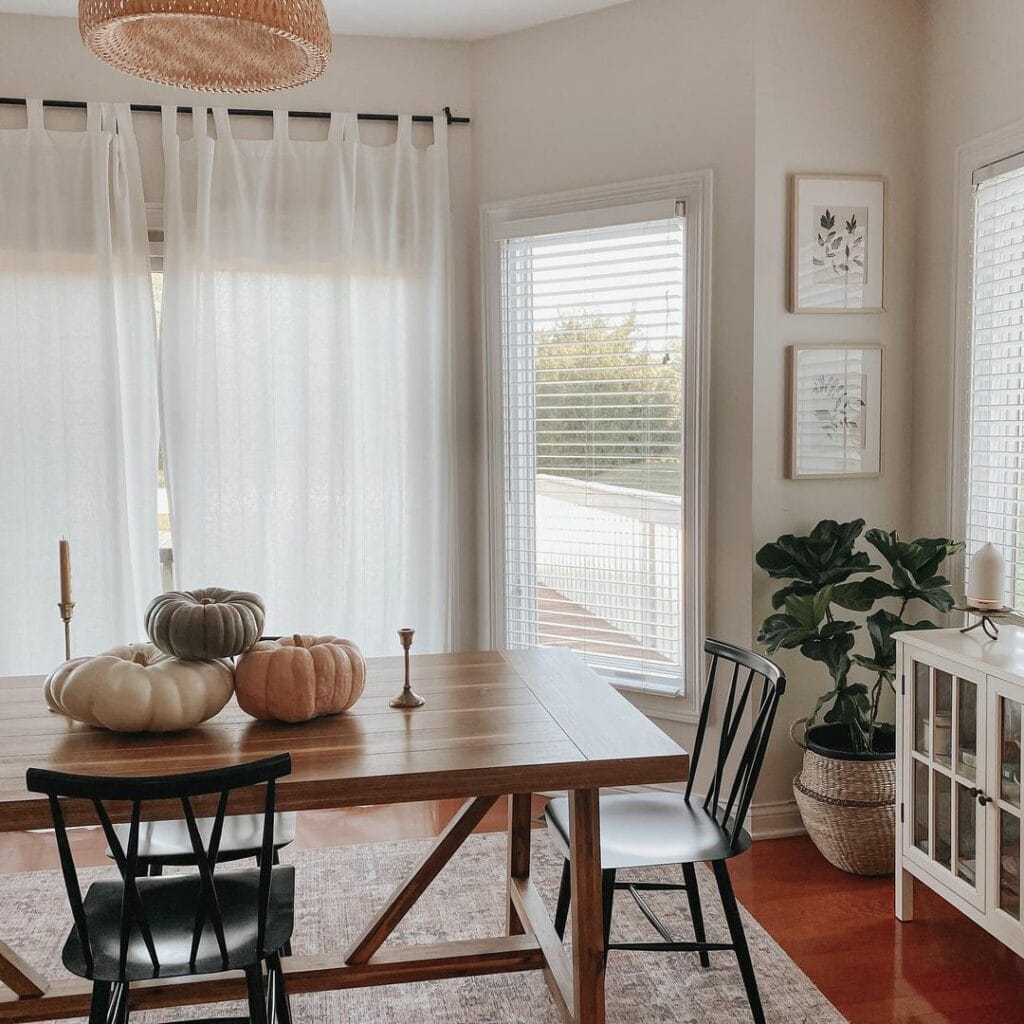 Sturdy Dining Table Features Stacked Centerpiece