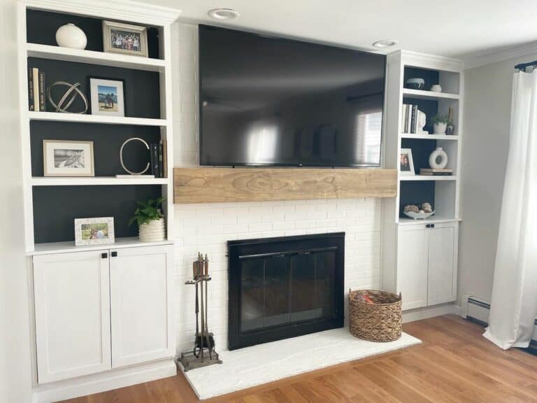 White Brick Fireplace With Built-in Shelving