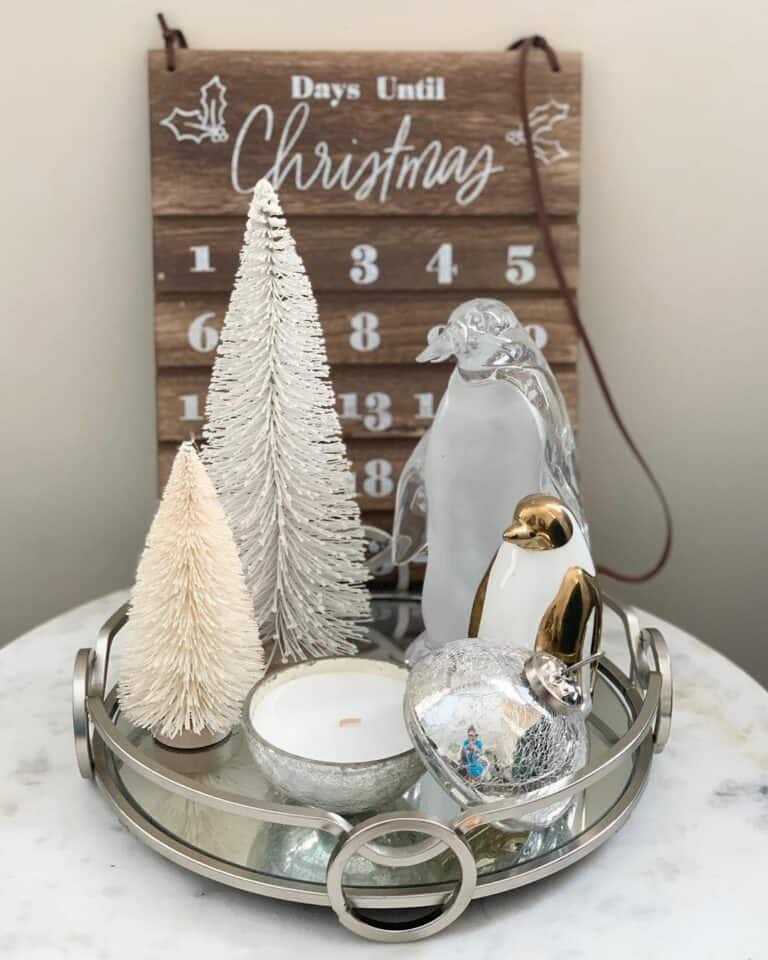 White and Silver Penguin Display With Wooden Calendar