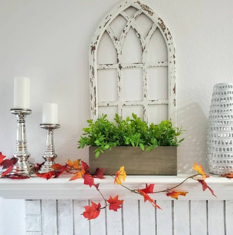 Fall Leaves Intertwined With Mantel Décor