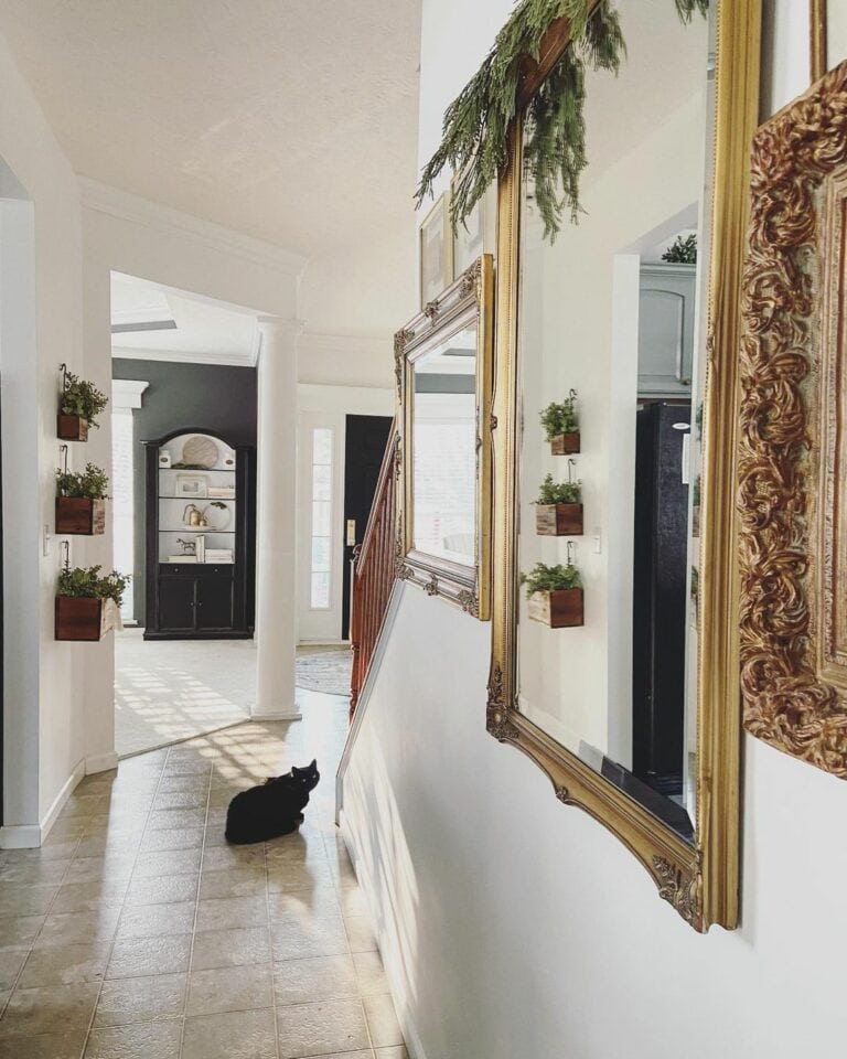 Brass Mirrors Replace a Gallery Wall