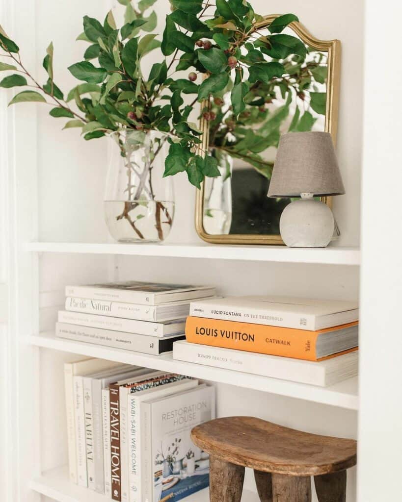 All White Books Stacked on the Shelves