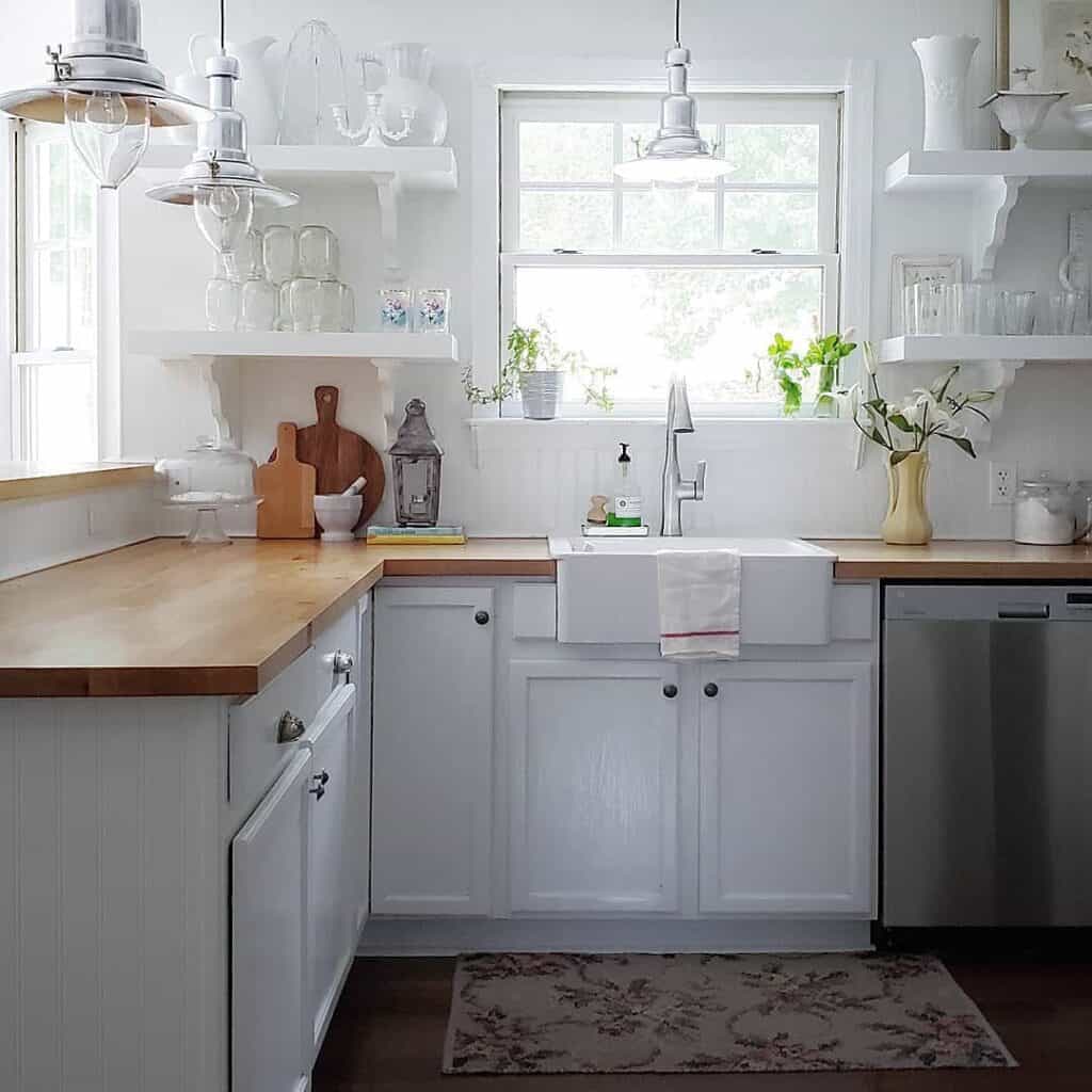 Butcher Block Countertops Highlighted by White Cabinets