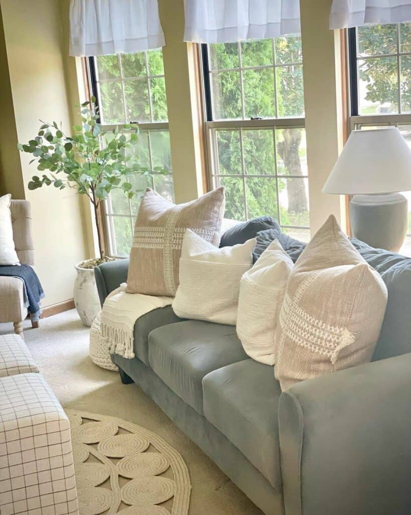 Circular White Jute Rug With Gray Couch Soul & Lane