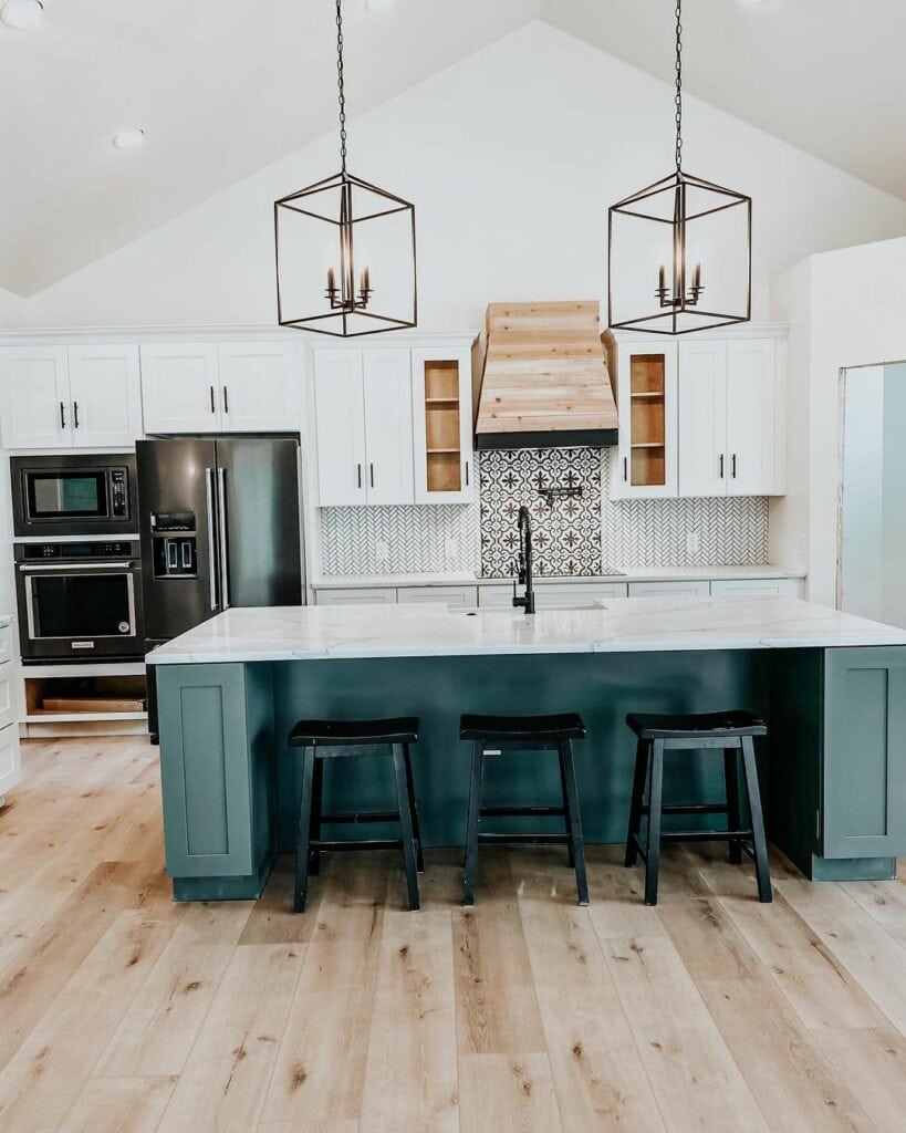 Deep Teal Island in an All-white Kitchen