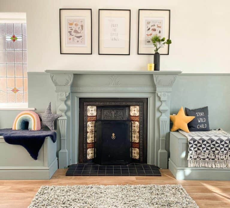 Duck Egg Blue Wainscoting Around Black Fireplace