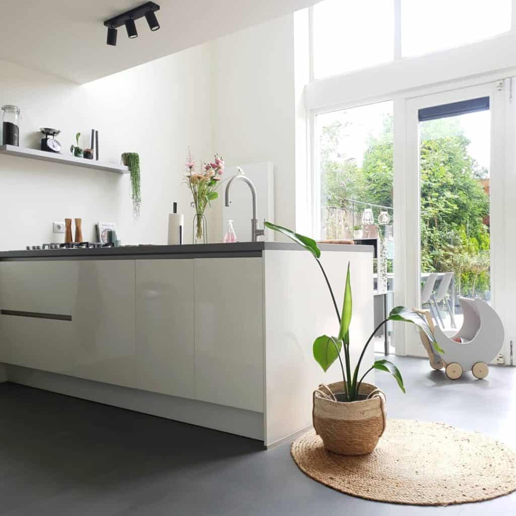 Flat-paneled Cabinets and Sleek Gray Tile