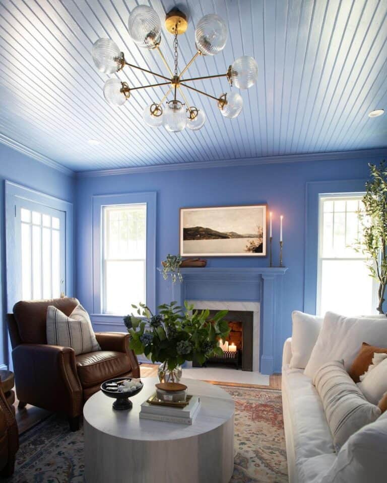 Funky Chandelier Over a Blue Living Room