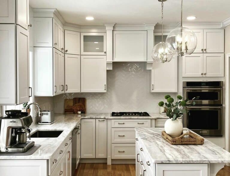 Gray and White Granite With Stainless Steel and White Cabinetry