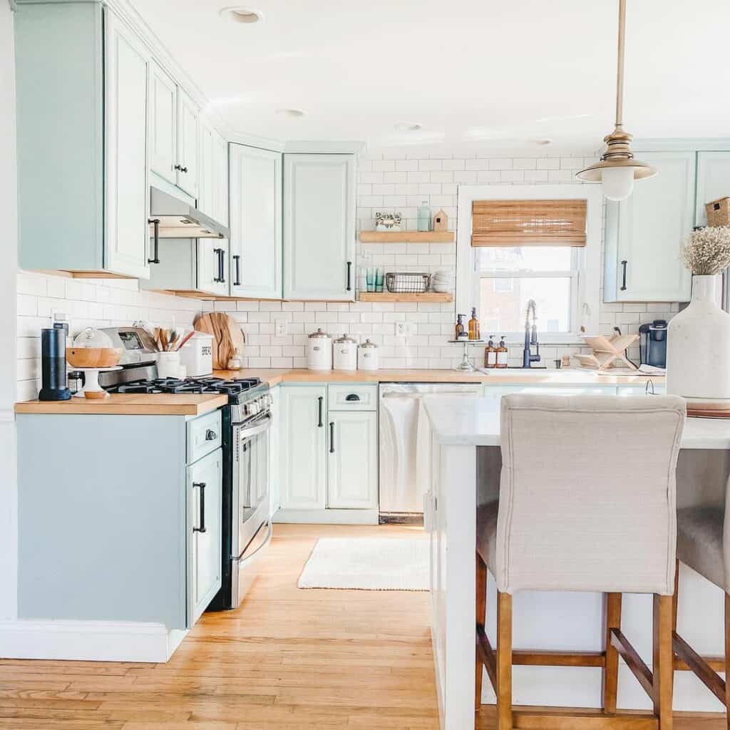 Light Wood Features and Soft Blue Cabinets