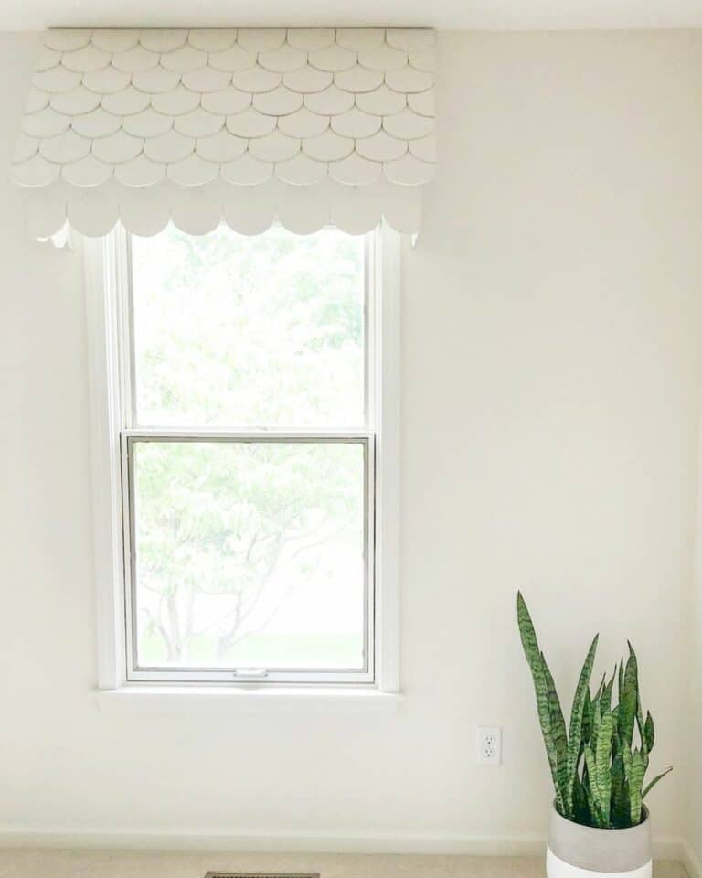 Whimsical Nursery Decor With a Scalloped Window Valance