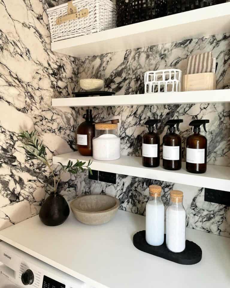White Shelves Stand Out Against Marbled Walls