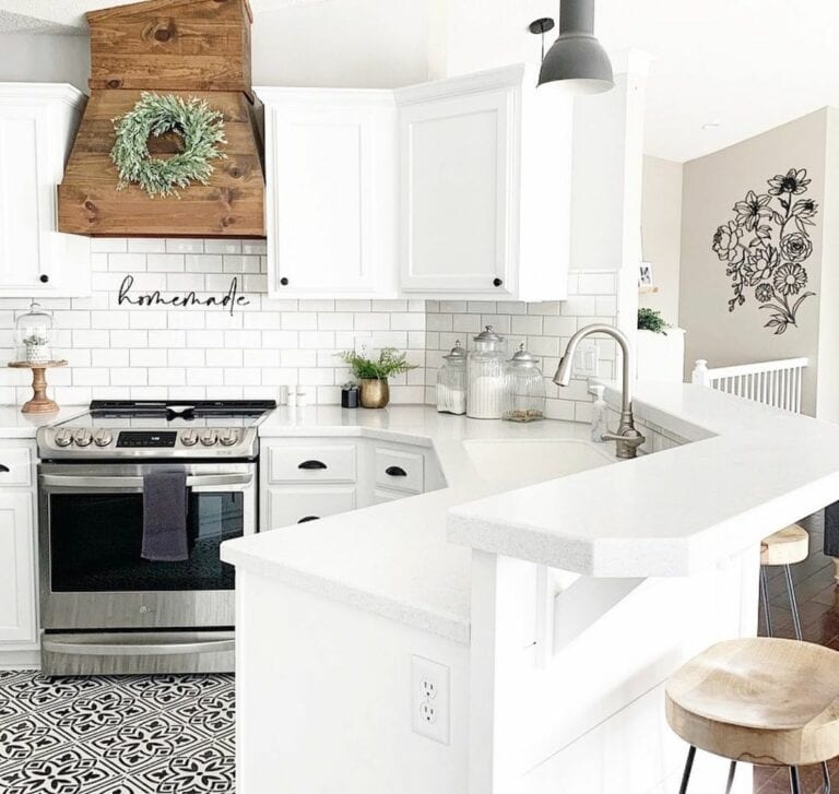 White and Black Cabinets With Stenciled Floor