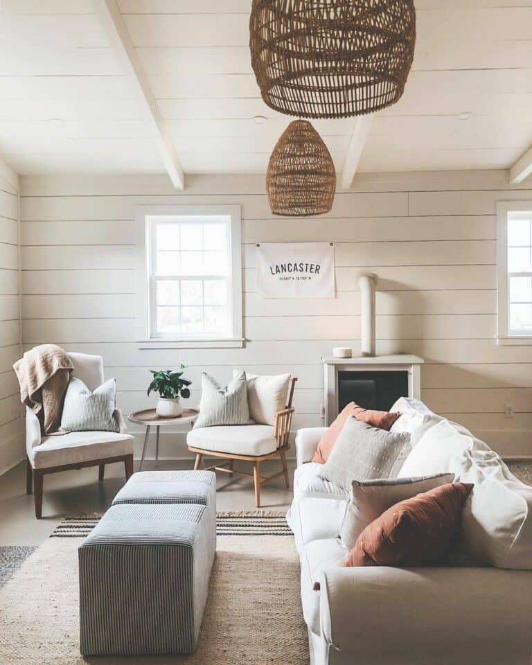 Whitewashed Living Room With Rust Accent Pillows
