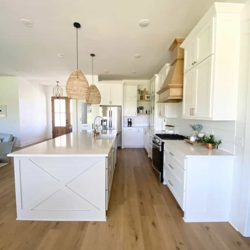 Wood Flooring Brings Warmth to a White Kitchen