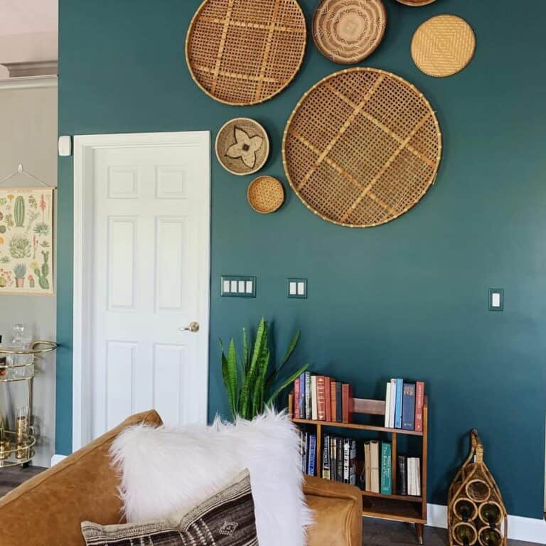 Deep Teal Accent Wall With Wicker Decor