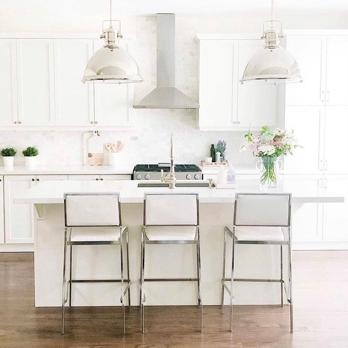 Modern White Kitchen With Floral Accents