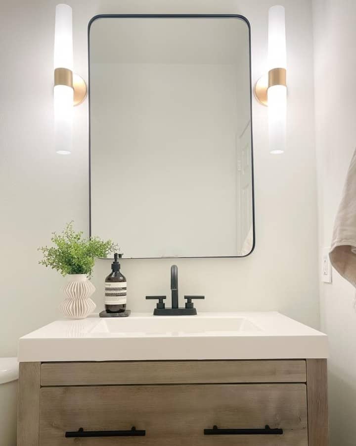 Powder Room With Tube Sconces