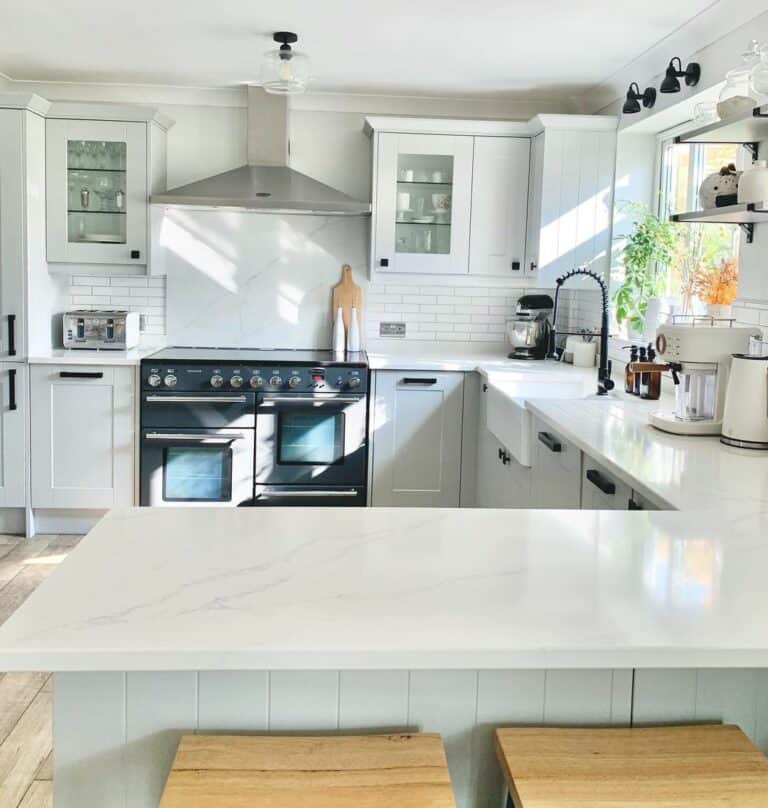 Roomy White Kitchen With Peninsula Counter
