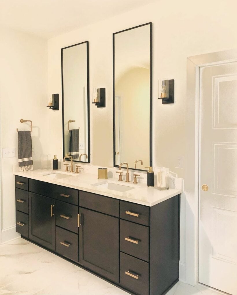 Two Oversized Mirrors With Three Sconces