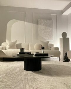 Contemporary White Living Room With Black Coffee Table